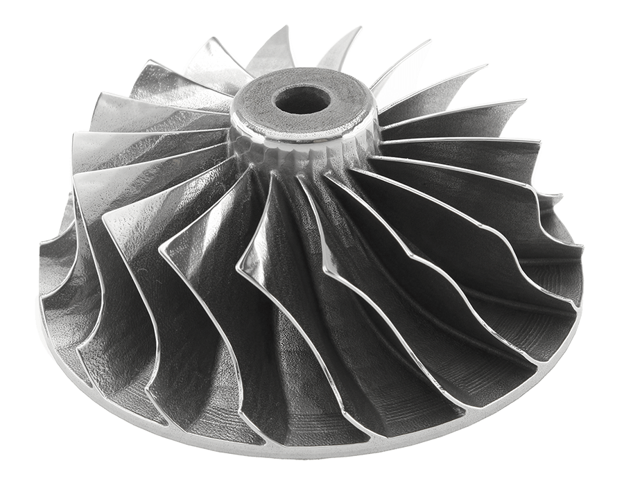 A metal turbine wheel with angled, polished blades on a white background, showing intricate engineering & symmetrical design.